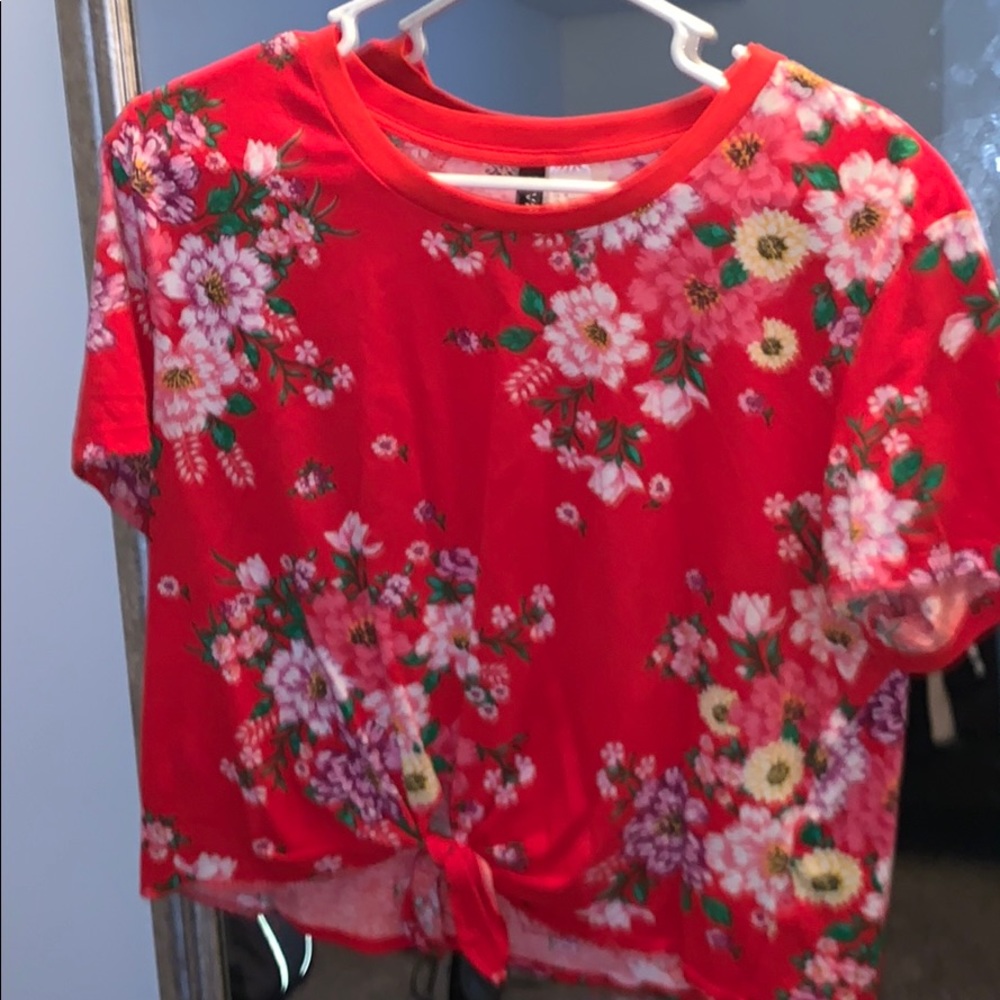 A red flower shirt